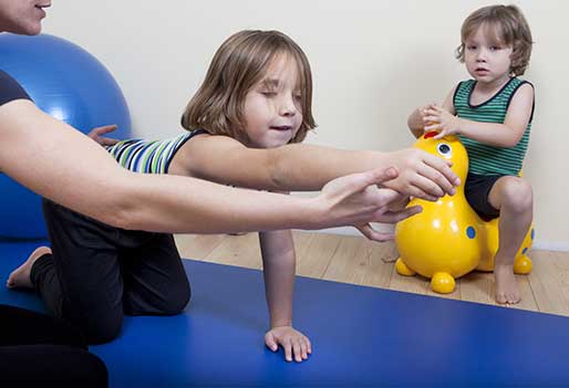 child in occuaptional therapy session